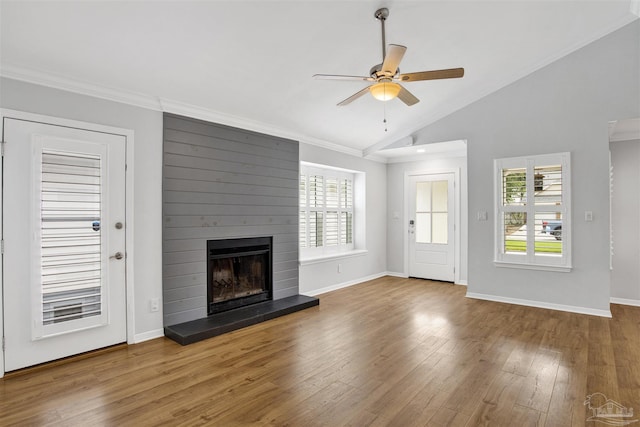 3108 Station Ct, Pensacola, FL 32504 - unfurnished living room with lofted ceiling, a fireplace, ceiling fan, plenty of natural light, and wood finished floors