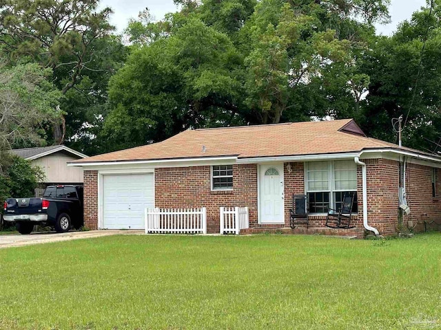 ranch-style house with a garage and a front yard