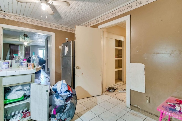 bathroom with tile patterned floors and ceiling fan