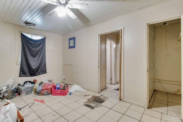 bathroom with tile patterned flooring and a ceiling fan