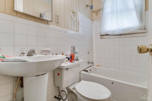 full bath with decorative backsplash, tile walls, and toilet