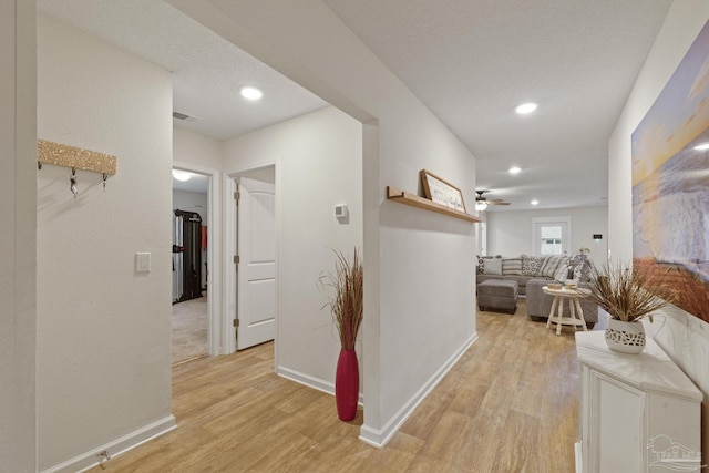 hall featuring light wood-type flooring