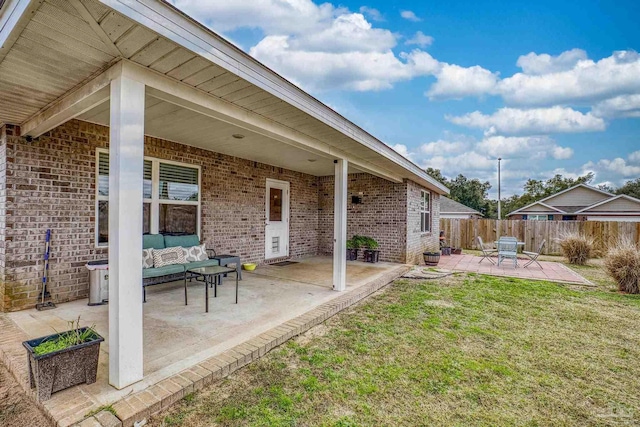 view of yard featuring outdoor lounge area and a patio area