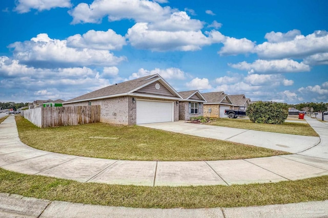 ranch-style home featuring a garage and a front yard