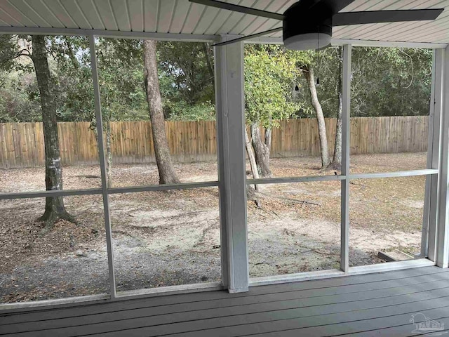 unfurnished sunroom with a wealth of natural light