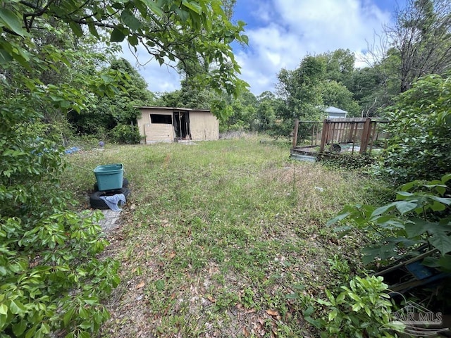 3010 N 6th Ave, Pensacola, FL 32503 - view of yard with an outbuilding, a storage shed, and fence