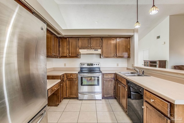 kitchen featuring lofted ceiling, pendant lighting, sink, stainless steel appliances, and light tile patterned floors