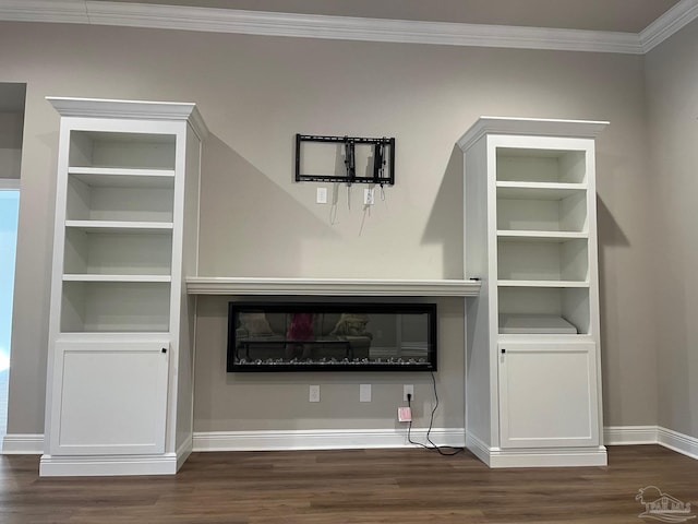 unfurnished living room with dark hardwood / wood-style flooring and crown molding