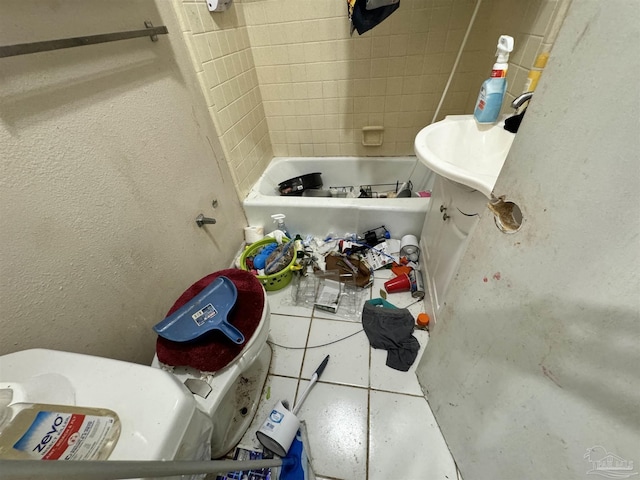 bathroom featuring tile patterned floors and sink