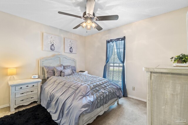 4701 Kitty Hawk Cir, Gulf Breeze, FL 32563 - bedroom with carpet floors, baseboards, and ceiling fan