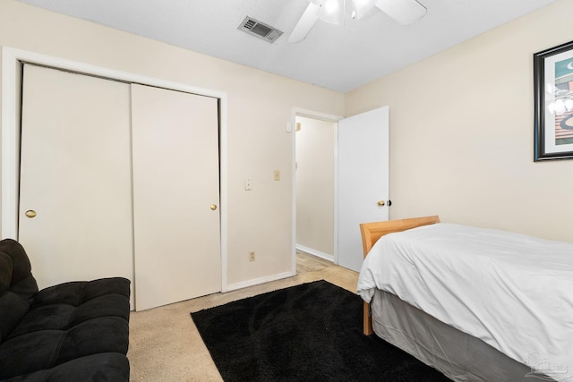 4701 Kitty Hawk Cir, Gulf Breeze, FL 32563 - bedroom with light colored carpet, a closet, and ceiling fan