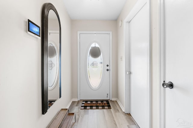 4701 Kitty Hawk Cir, Gulf Breeze, FL 32563 - entryway with light wood-style flooring and baseboards