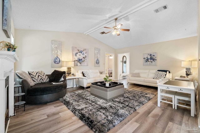 4701 Kitty Hawk Cir, Gulf Breeze, FL 32563 - living area with a ceiling fan, wood finished floors, and a fireplace