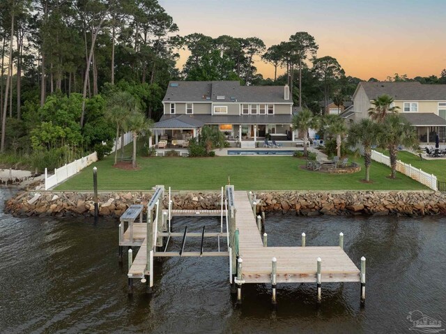 2950 Coral Strip Pkwy, Gulf Breeze, FL 32563 - dock area with a water view, an outdoor pool, a patio area, and boat lift