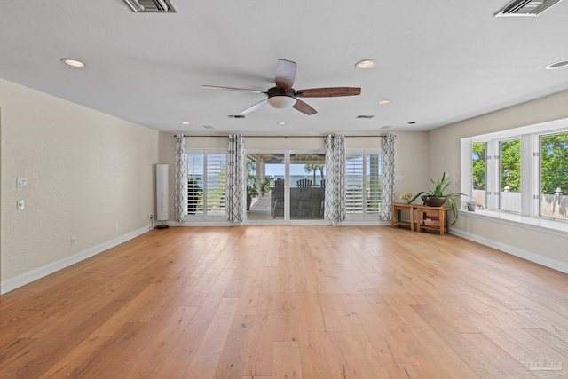 2950 Coral Strip Pkwy, Gulf Breeze, FL 32563 - living area with baseboards, recessed lighting, light wood-style floors, and ceiling fan
