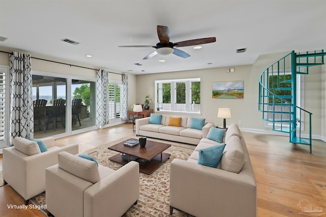 2950 Coral Strip Pkwy, Gulf Breeze, FL 32563 - living area featuring wood finished floors, ceiling fan, stairway, baseboards, and recessed lighting