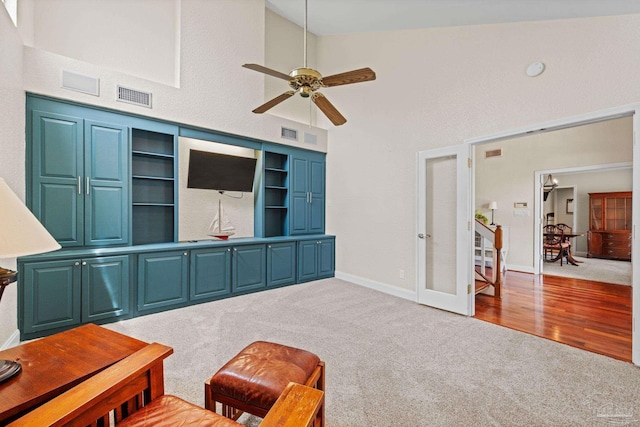 2950 Coral Strip Pkwy, Gulf Breeze, FL 32563 - sitting room with carpet floors, french doors, ceiling fan, high vaulted ceiling, and baseboards