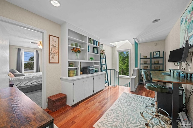 2950 Coral Strip Pkwy, Gulf Breeze, FL 32563 - office space featuring light wood-style floors and a textured wall