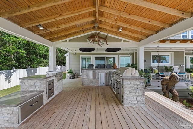 2950 Coral Strip Pkwy, Gulf Breeze, FL 32563 - deck featuring exterior kitchen, fence, a grill, and a gazebo