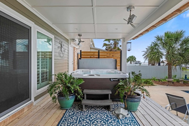 2950 Coral Strip Pkwy, Gulf Breeze, FL 32563 - wooden deck featuring a hot tub, fence, ceiling fan, and a patio