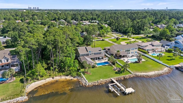 2950 Coral Strip Pkwy, Gulf Breeze, FL 32563 - aerial view of a large body of water, a pool, and a heavily wooded area