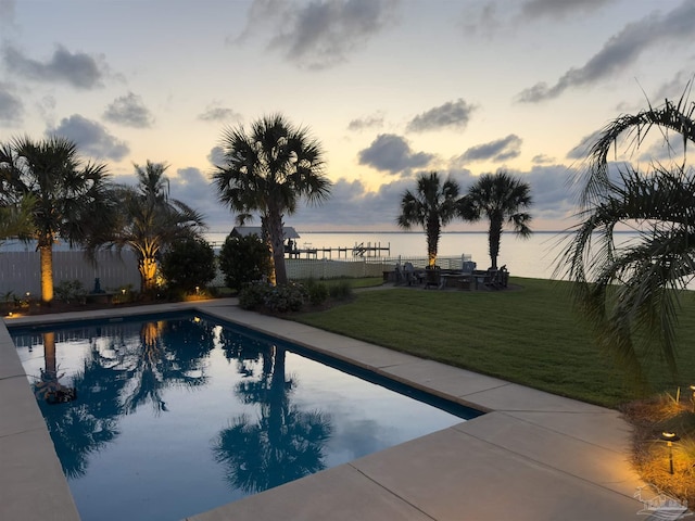 2950 Coral Strip Pkwy, Gulf Breeze, FL 32563 - pool at dusk featuring a water view
