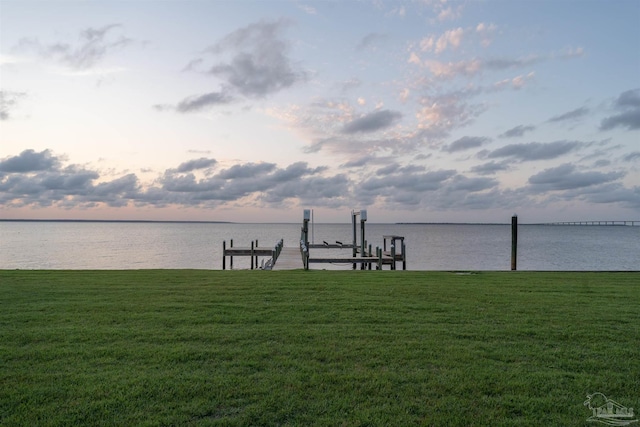 2950 Coral Strip Pkwy, Gulf Breeze, FL 32563 - dock area with a water view and a yard