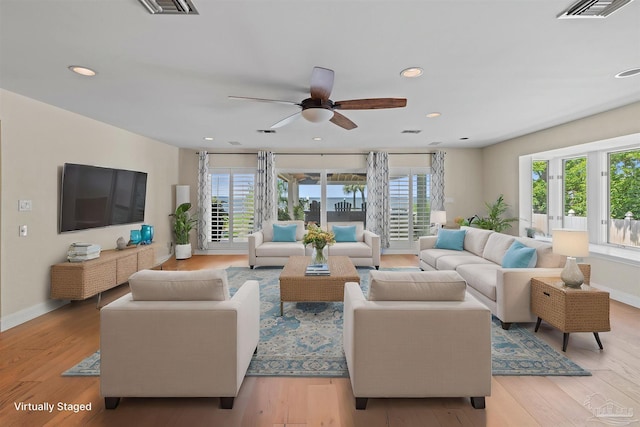 2950 Coral Strip Pkwy, Gulf Breeze, FL 32563 - living area with baseboards, light wood-style flooring, recessed lighting, and ceiling fan