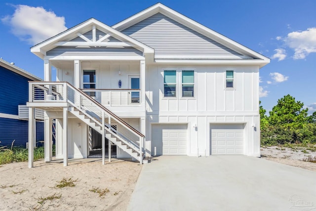 view of front of house featuring a garage and covered porch