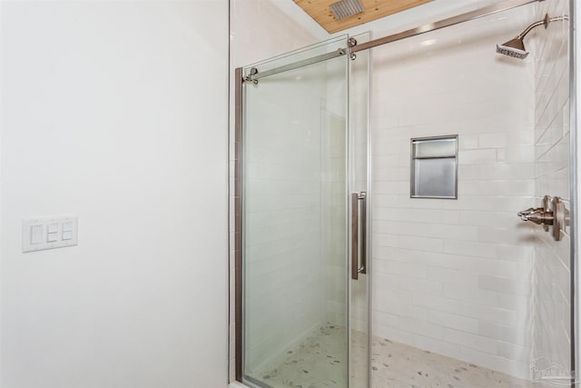 bathroom with an enclosed shower