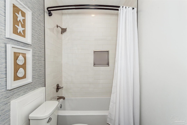 bathroom with toilet and shower / bath combo with shower curtain