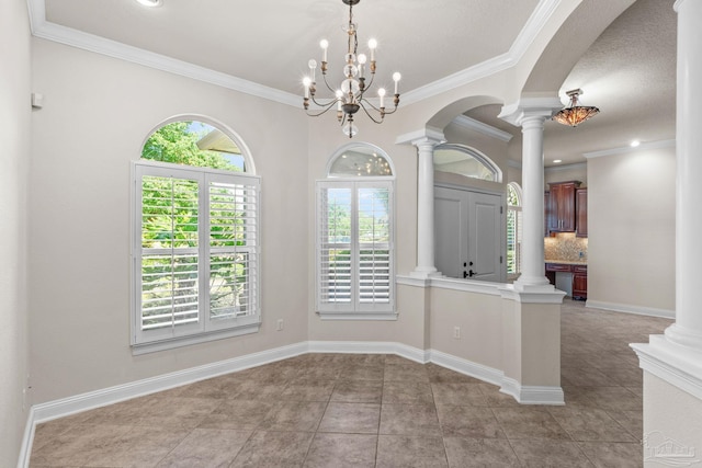 4166 Madura Four, Gulf Breeze, FL 32563 - empty room with ornate columns, light tile patterned flooring, crown molding, and arched walkways