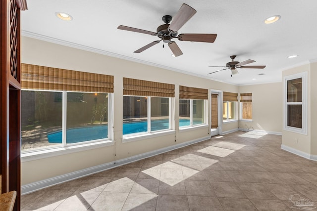 4166 Madura Four, Gulf Breeze, FL 32563 - unfurnished sunroom featuring ornamental molding, tile patterned flooring, baseboards, and recessed lighting