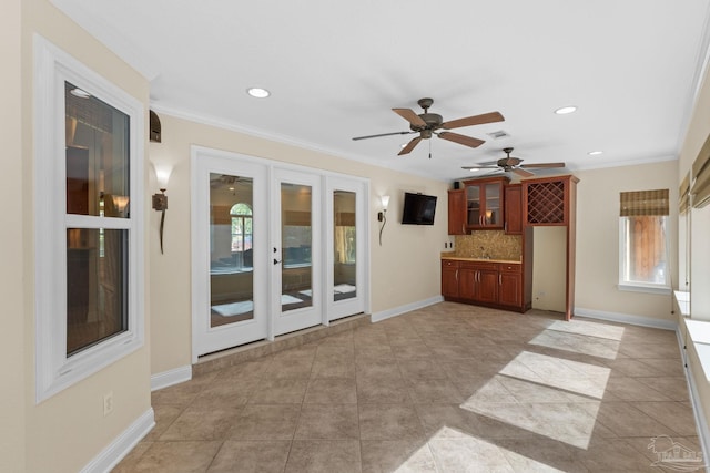 4166 Madura Four, Gulf Breeze, FL 32563 - unfurnished living room with a ceiling fan, healthy amount of natural light, french doors, crown molding, and recessed lighting