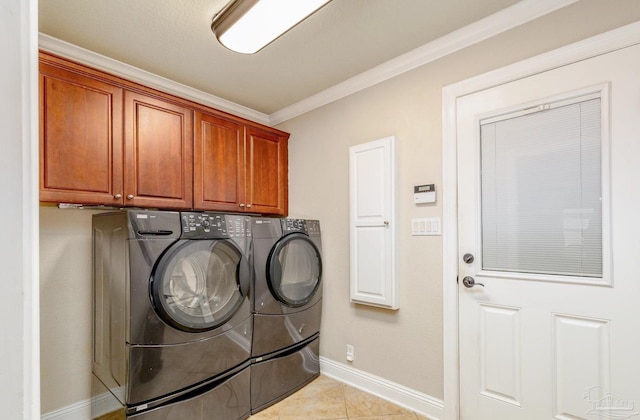 4166 Madura Four, Gulf Breeze, FL 32563 - clothes washing area with cabinet space, separate washer and dryer, ornamental molding, baseboards, and light tile patterned floors