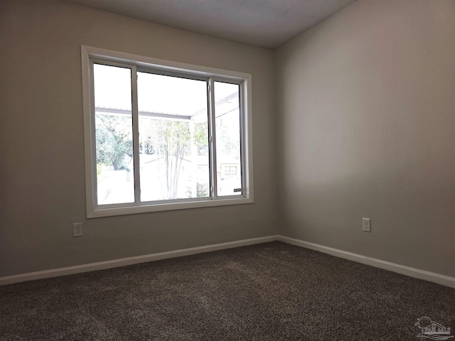 5666 Vestavia Ln, Pensacola, FL 32526 - carpeted empty room with baseboards and plenty of natural light