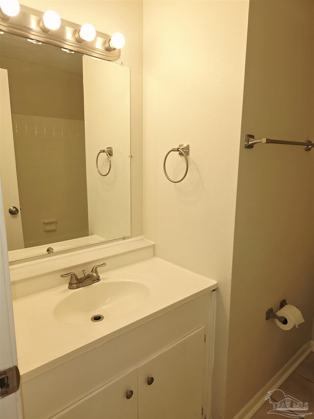 5666 Vestavia Ln, Pensacola, FL 32526 - bathroom with tile patterned flooring and vanity