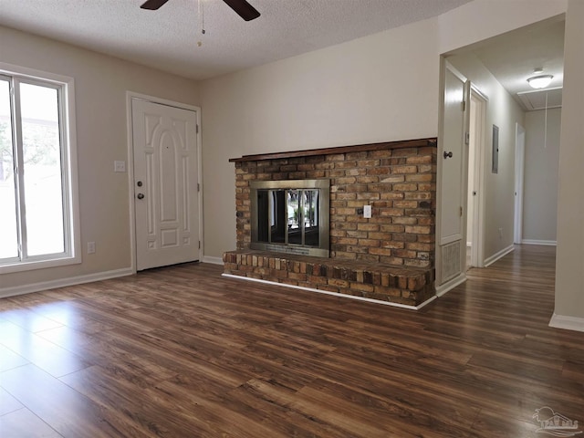 5666 Vestavia Ln, Pensacola, FL 32526 - unfurnished living room with plenty of natural light, attic access, a ceiling fan, and wood finished floors