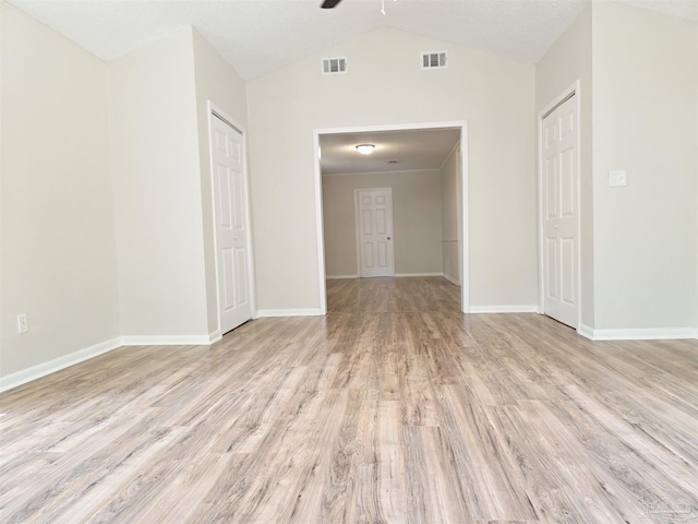 5666 Vestavia Ln, Pensacola, FL 32526 - unfurnished room featuring visible vents, light wood-style flooring, a ceiling fan, and vaulted ceiling