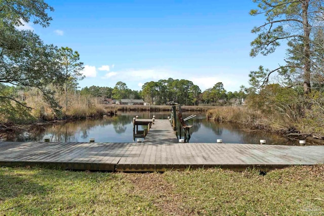 view of dock with a water view