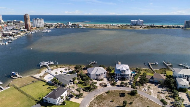 birds eye view of property featuring a water view