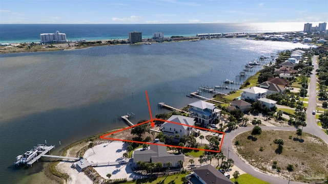 birds eye view of property featuring a water view