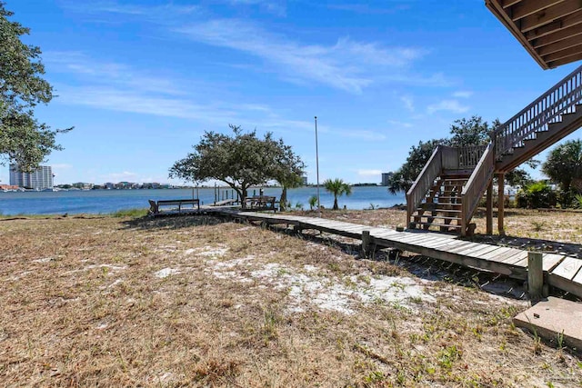 dock area with a water view