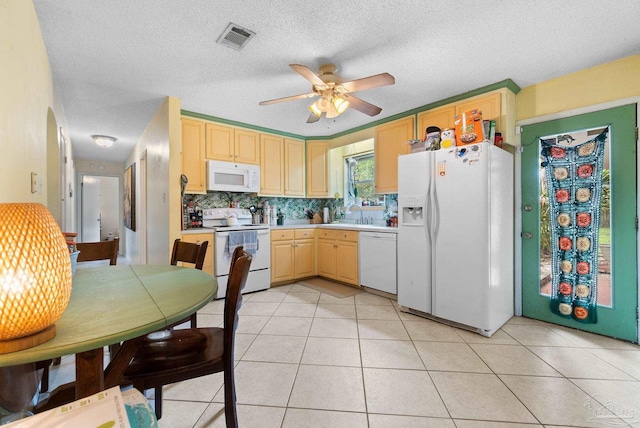 6555 Bellview Pines Pl, Pensacola, FL 32526 - kitchen featuring white appliances, light brown cabinetry, light countertops, a ceiling fan, and tasteful backsplash
