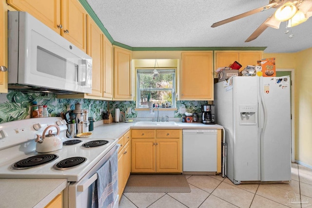 6555 Bellview Pines Pl, Pensacola, FL 32526 - kitchen with white appliances, a sink, light countertops, light tile patterned flooring, and backsplash