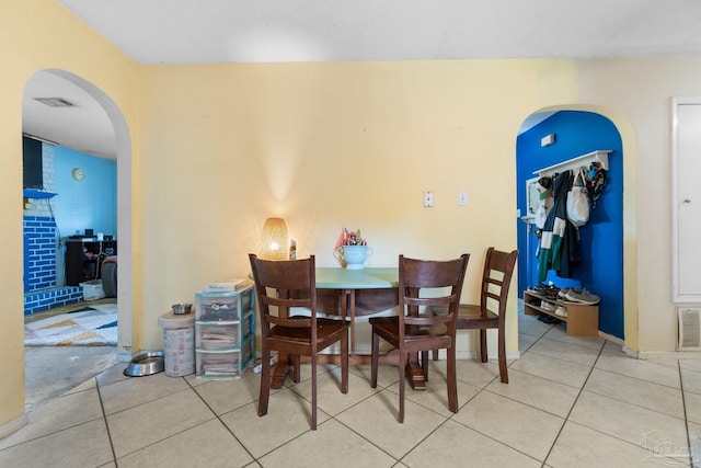 6555 Bellview Pines Pl, Pensacola, FL 32526 - dining space featuring arched walkways and tile patterned flooring