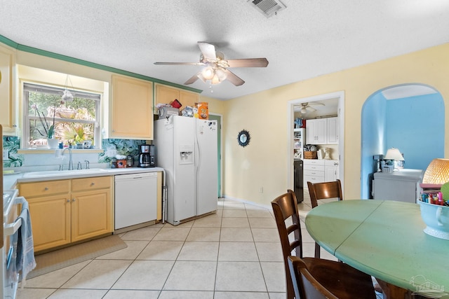 6555 Bellview Pines Pl, Pensacola, FL 32526 - kitchen featuring white appliances, a sink, a ceiling fan, a textured ceiling, and light tile patterned floors