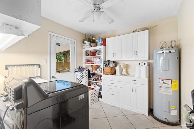 6555 Bellview Pines Pl, Pensacola, FL 32526 - kitchen featuring electric water heater, washing machine and clothes dryer, white cabinetry, a ceiling fan, and light tile patterned floors