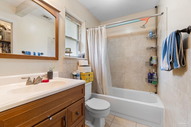 6555 Bellview Pines Pl, Pensacola, FL 32526 - bathroom with vanity, toilet, tile patterned flooring, shower / bath combo, and a textured ceiling