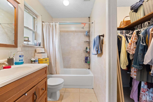6555 Bellview Pines Pl, Pensacola, FL 32526 - bathroom featuring a textured ceiling, vanity, toilet, tile patterned flooring, and shower / bath combo